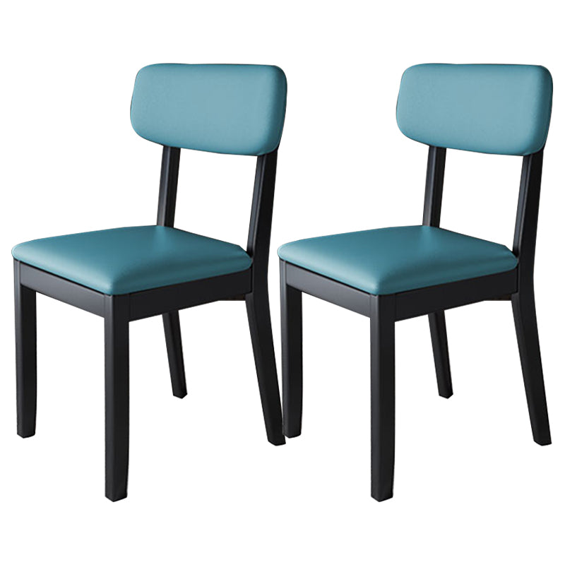 Silla auxiliar de comedor moderna, silla con respaldo abierto curvado de madera maciza y cuero con acabado mate