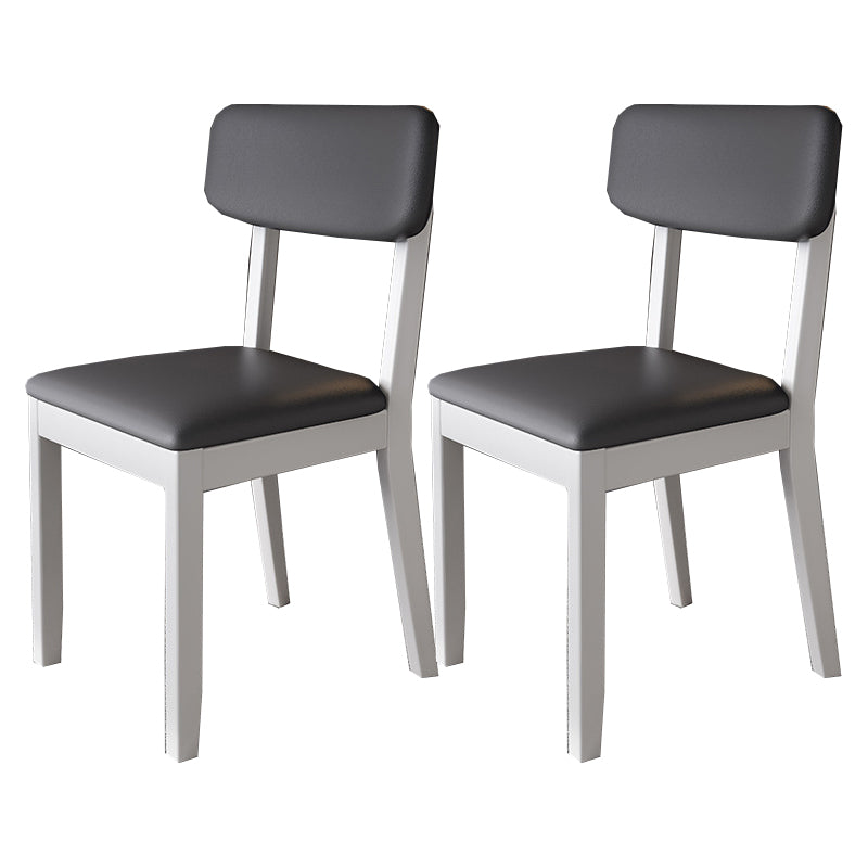 Silla auxiliar de comedor moderna, silla con respaldo abierto curvado de madera maciza y cuero con acabado mate