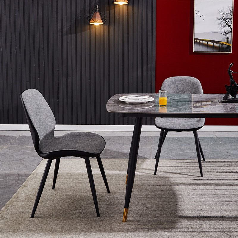La parte posterior sólida sin brazos del diseño minimalista preside el cuero de la microfibra que cena la silla lateral