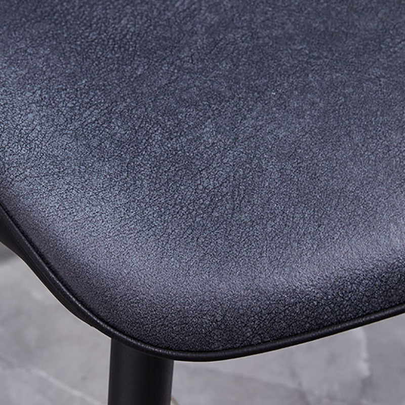 La parte posterior sólida sin brazos del diseño minimalista preside el cuero de la microfibra que cena la silla lateral
