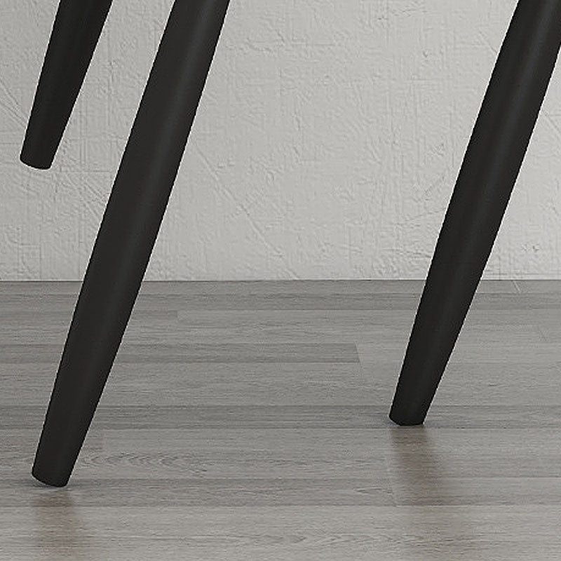 Silla de comedor tapizada casera moderna con respaldo abierto y acabado mate