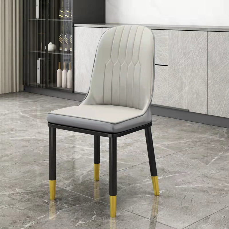 Silla de comedor sin brazos con respaldo sólido de comedor de cuero de PU de estilo escandinavo