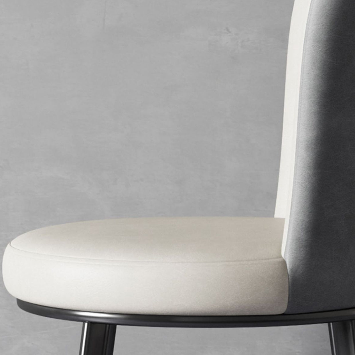 El lado contemporáneo del comedor preside la silla curvada de cuero mate de Parsons