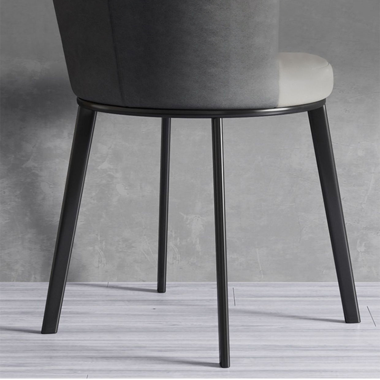 El lado contemporáneo del comedor preside la silla curvada de cuero mate de Parsons