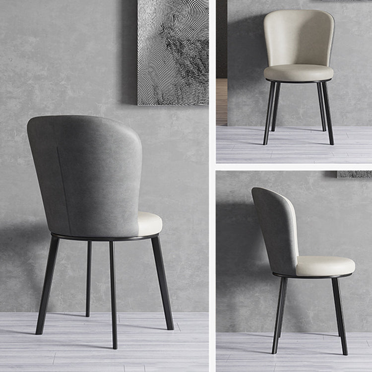 El lado contemporáneo del comedor preside la silla curvada de cuero mate de Parsons