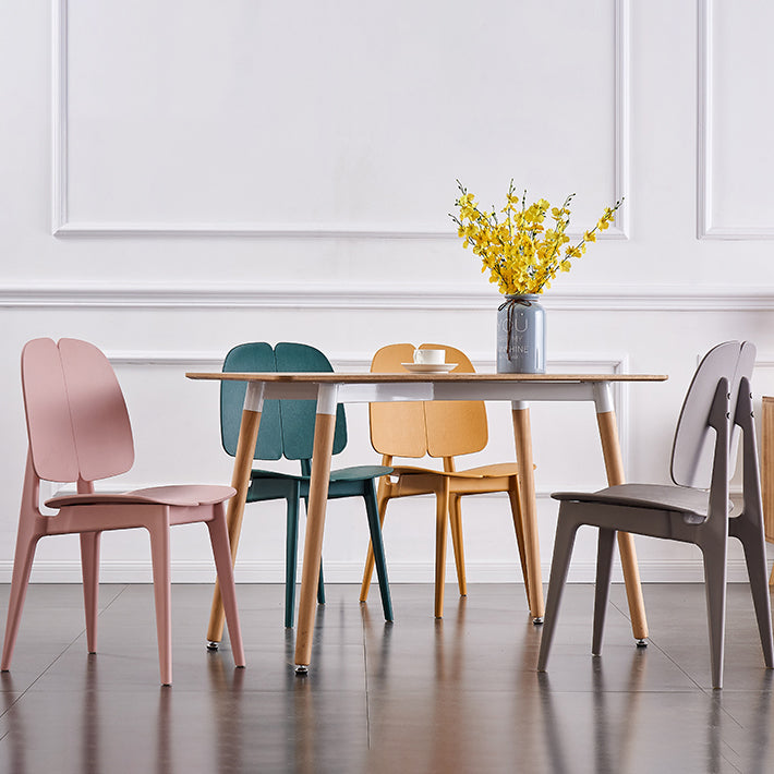 Sillas de comedor y decorativas contemporáneas Silla lateral de plástico con respaldo abierto para interiores y exteriores