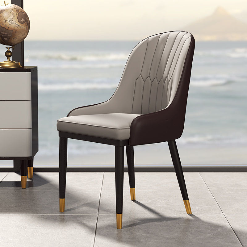 Silla auxiliar de comedor de cuero con respaldo sólido de diseño escandinavo