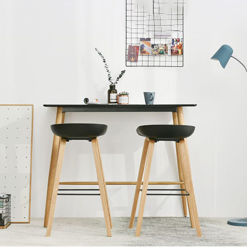 Moderne massief houten barkruk met voetsteun en barkruk van acryl met lage rugleuning