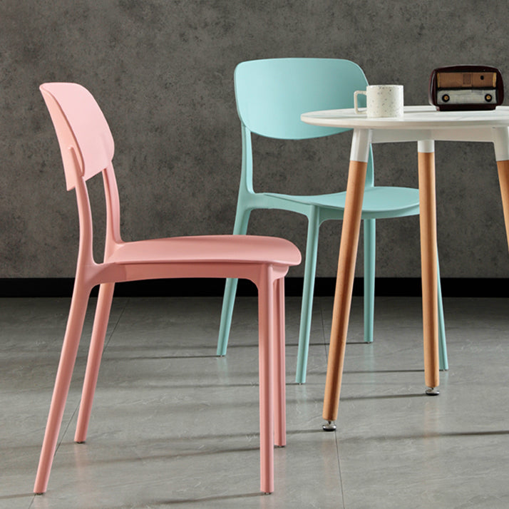 Sillas modernas de comedor y acento Silla sin brazos con respaldo abierto de plástico para interiores y exteriores