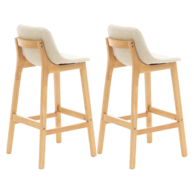 Taburete de bar de estilo escandinavo, asiento tipo cubo con patas de madera y respaldo bajo para barra de cocina