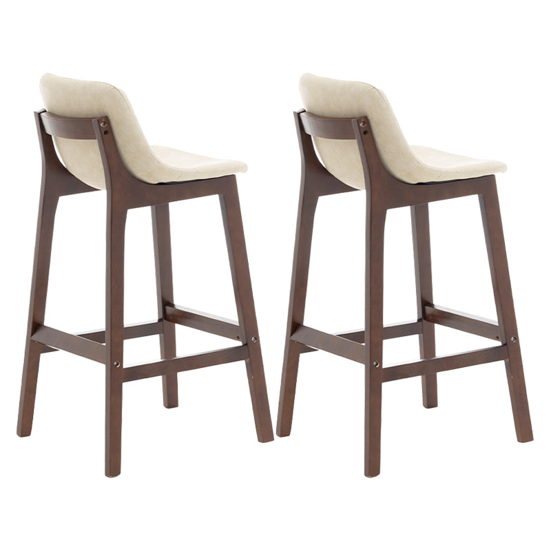 Taburete de bar de estilo escandinavo, asiento tipo cubo con patas de madera y respaldo bajo para barra de cocina