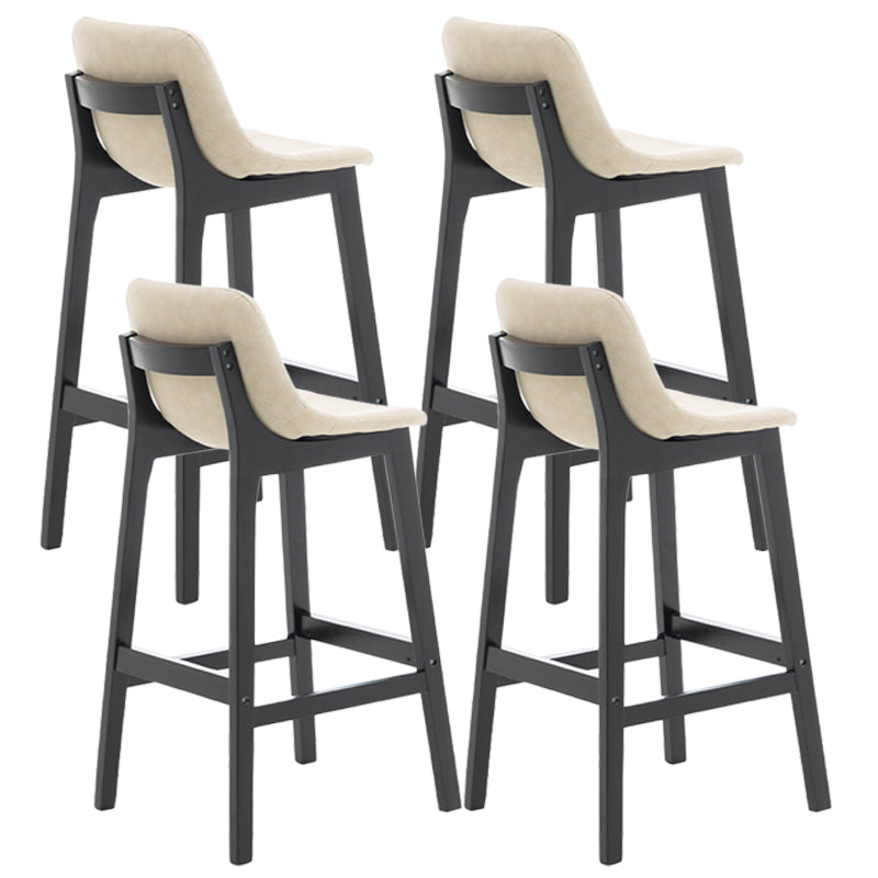 Taburete de bar de estilo escandinavo, asiento tipo cubo con patas de madera y respaldo bajo para barra de cocina