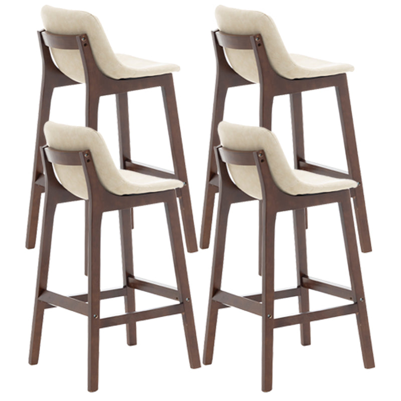 Taburete de bar de estilo escandinavo, asiento tipo cubo con patas de madera y respaldo bajo para barra de cocina