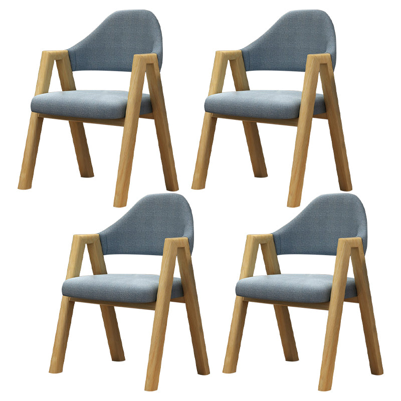Silla de comedor moderna con respaldo abierto y acabado mate de sillón de tela para restaurante