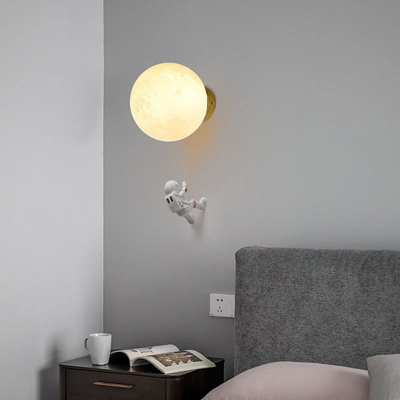 Lampada da parete astronauta e piante