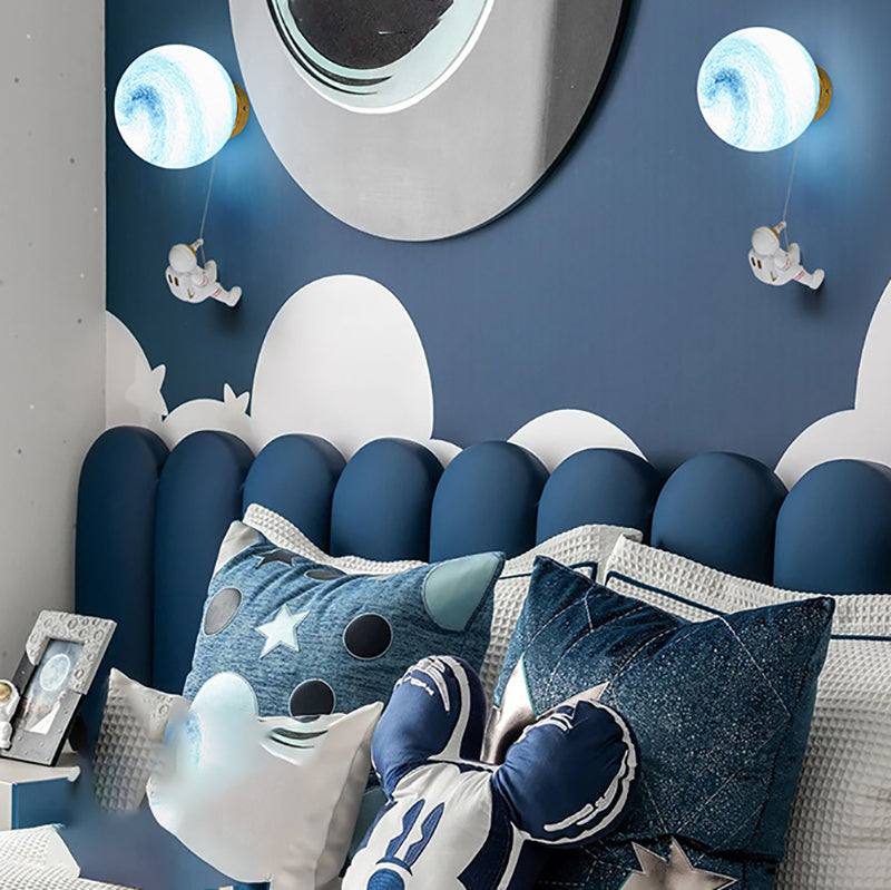 Lampada da parete astronauta e piante