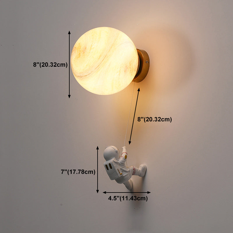 Lampada da parete astronauta e piante