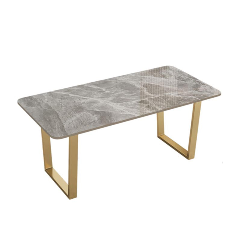 Mesa de cocina rectangular de lujo con superficie de piedra sinterizada y pedestal doble en dorado