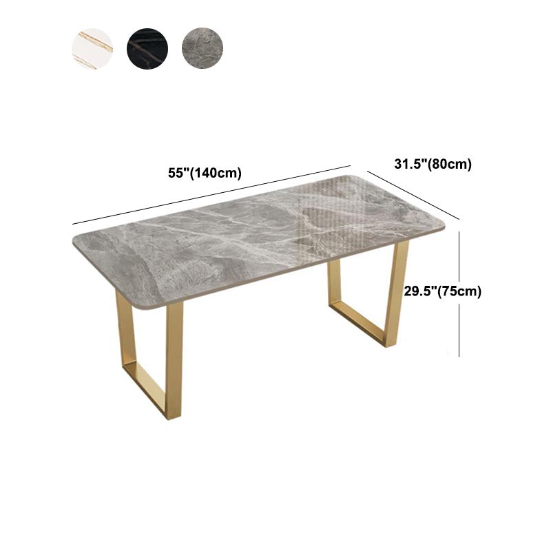 Mesa de cocina rectangular de lujo con superficie de piedra sinterizada y pedestal doble en dorado