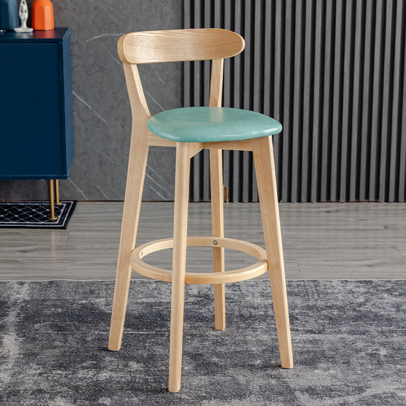Taburete de bar estilo escandinavo con patas de madera y reposapiés con respaldo bajo para barra de cocina