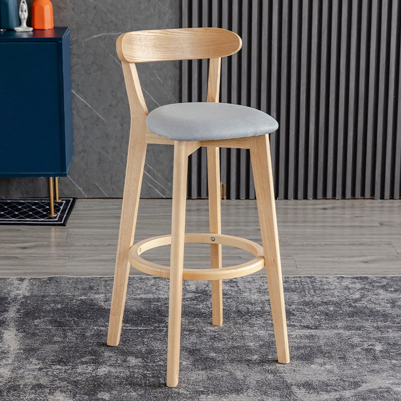 Taburete de bar estilo escandinavo con patas de madera y reposapiés con respaldo bajo para barra de cocina