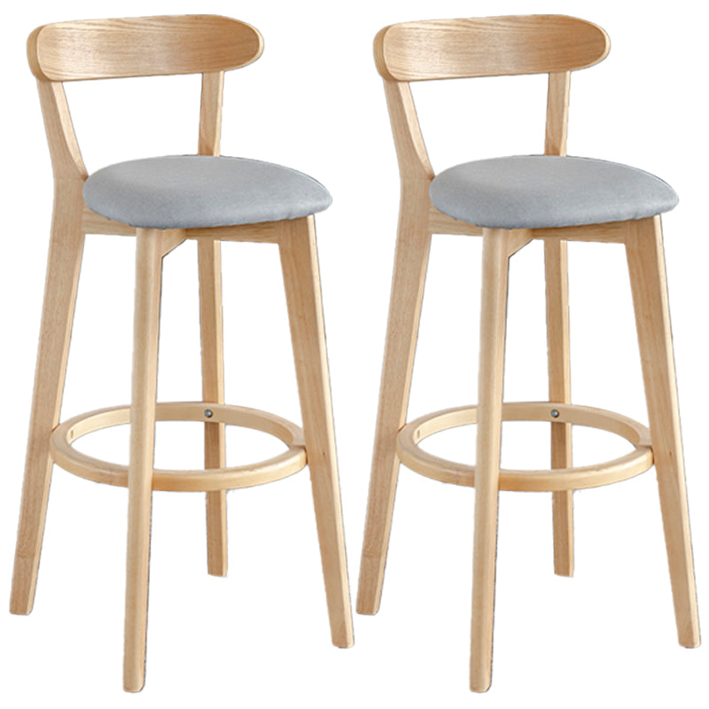 Taburete de bar estilo escandinavo con patas de madera y reposapiés con respaldo bajo para barra de cocina