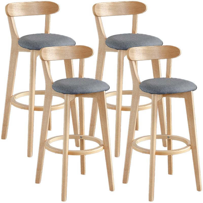 Taburete de bar estilo escandinavo con patas de madera y reposapiés con respaldo bajo para barra de cocina
