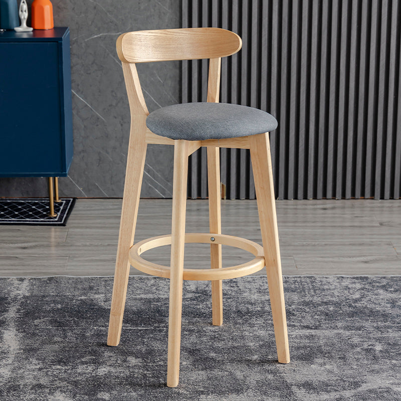 Taburete de bar estilo escandinavo con patas de madera y reposapiés con respaldo bajo para barra de cocina
