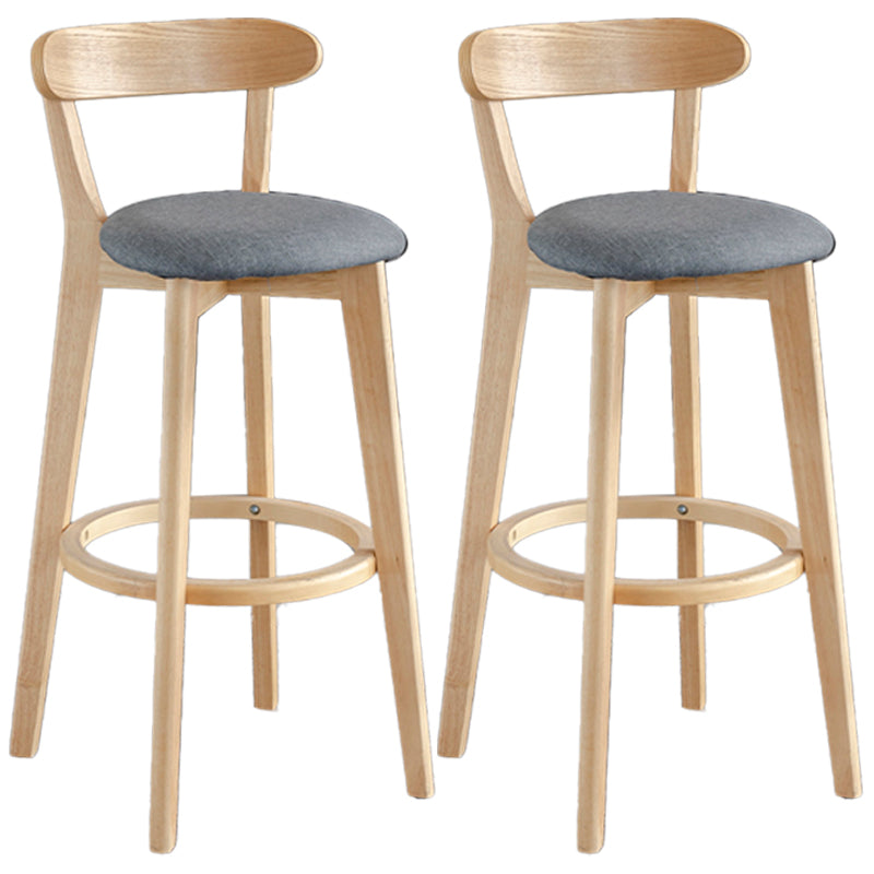 Taburete de bar estilo escandinavo con patas de madera y reposapiés con respaldo bajo para barra de cocina