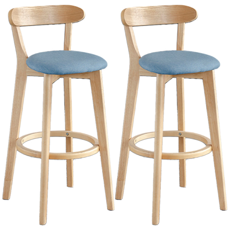 Taburete de bar estilo escandinavo con patas de madera y reposapiés con respaldo bajo para barra de cocina