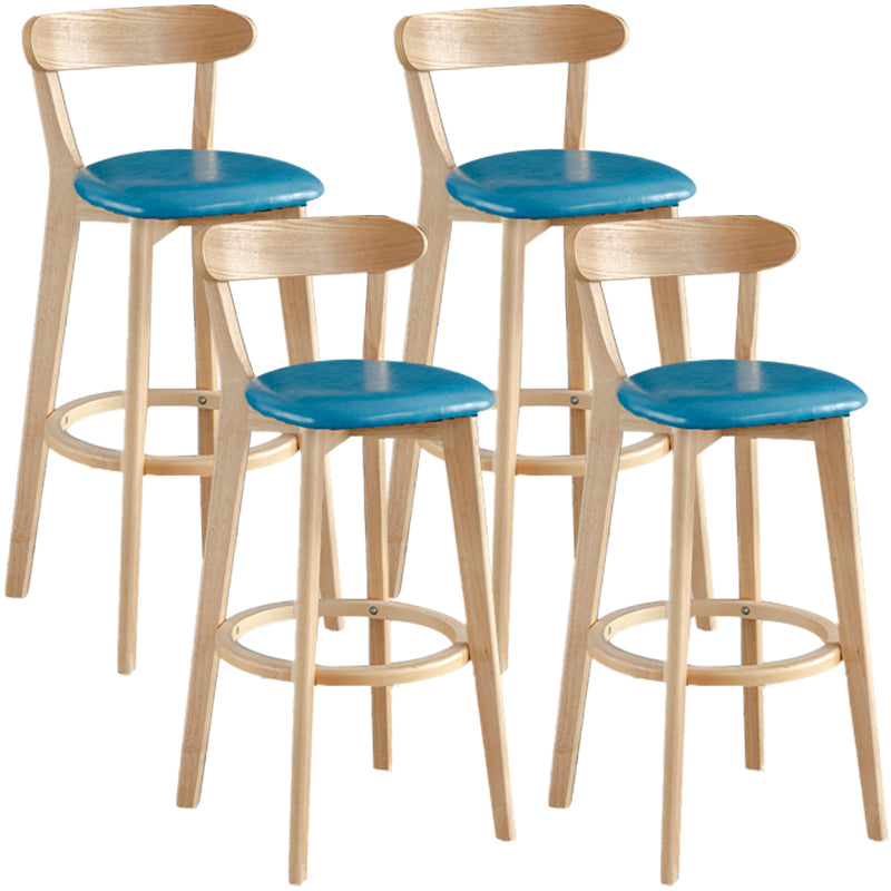 Taburete de bar estilo escandinavo con patas de madera y reposapiés con respaldo bajo para barra de cocina