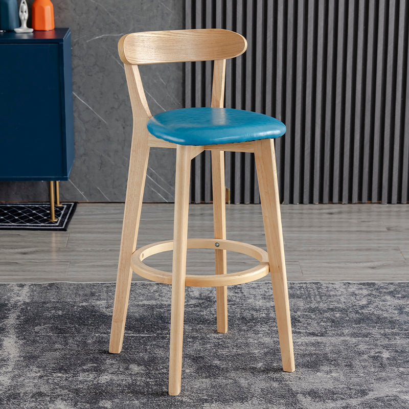Taburete de bar estilo escandinavo con patas de madera y reposapiés con respaldo bajo para barra de cocina