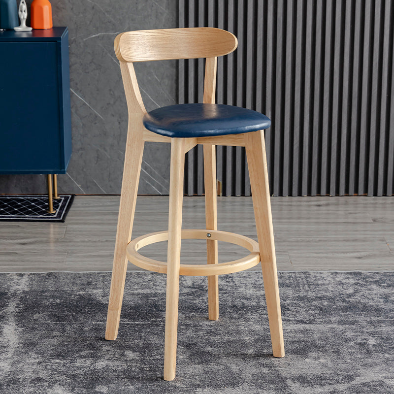 Taburete de bar estilo escandinavo con patas de madera y reposapiés con respaldo bajo para barra de cocina