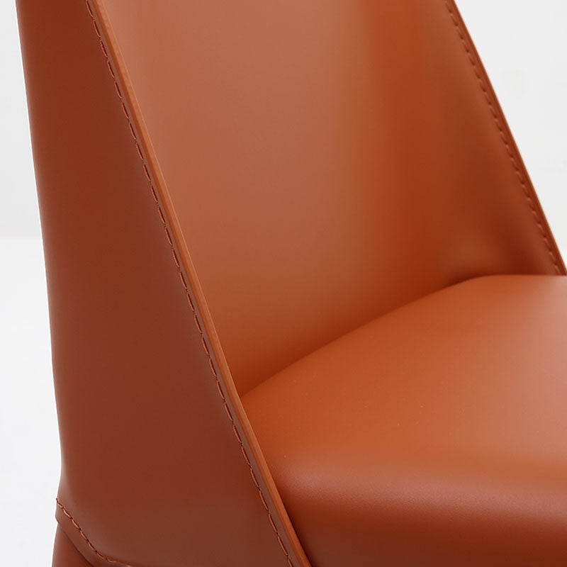 Silla de comedor de cuero sin brazos contemporánea Sillas de comedor de metal