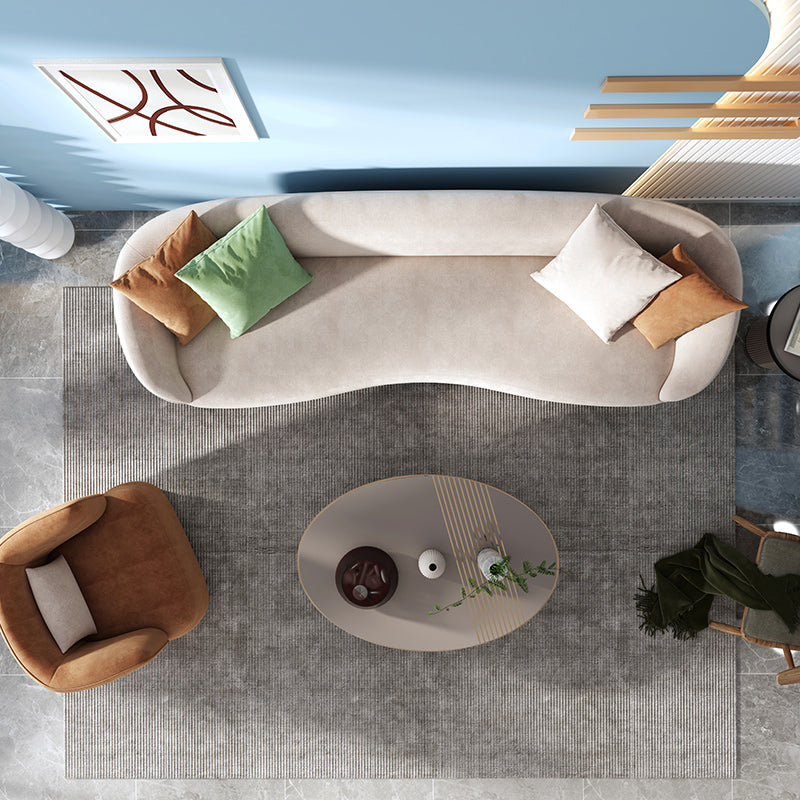 Loveseat curvado de terciopelo moderno con espalda apretada para una sala de bonificación