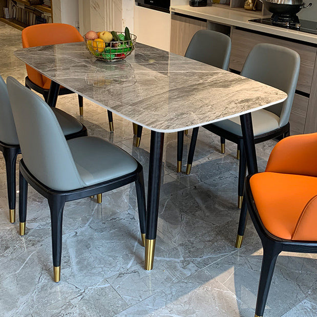 Mesa de comedor de piedra con 4 piernas negras