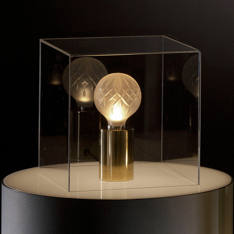 Lámpara de mesa de noche de cristal transparente moderna con luz LED esférica en color dorado con base de metal