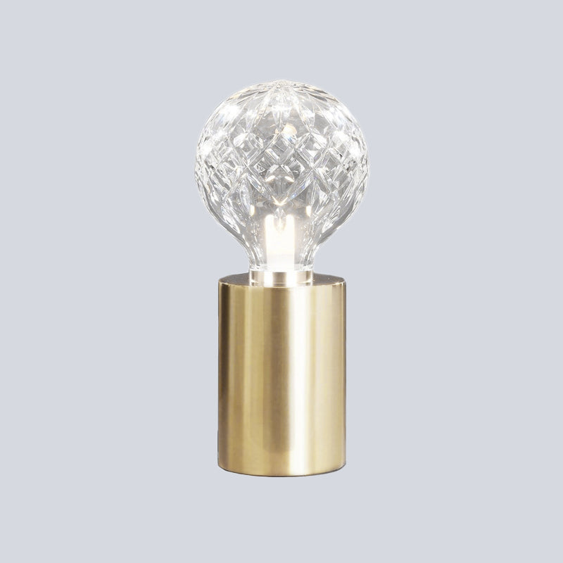 Lámpara de mesa de noche de cristal transparente moderna con luz LED esférica en color dorado con base de metal