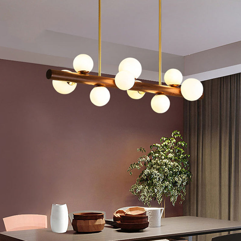 Luces colgantes de restaurantes de múltiples cabezas de madera moderna con sombra de vidrio de globo