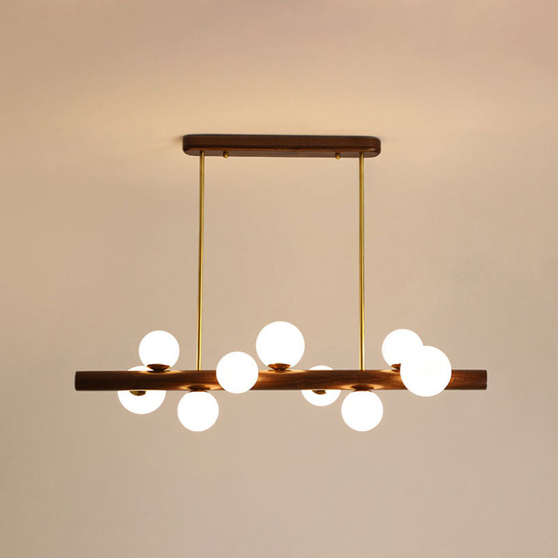 Luces colgantes de restaurantes de múltiples cabezas de madera moderna con sombra de vidrio de globo