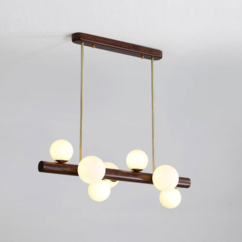 Luces colgantes de restaurantes de múltiples cabezas de madera moderna con sombra de vidrio de globo