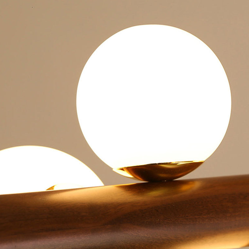 Luces colgantes de restaurantes de múltiples cabezas de madera moderna con sombra de vidrio de globo