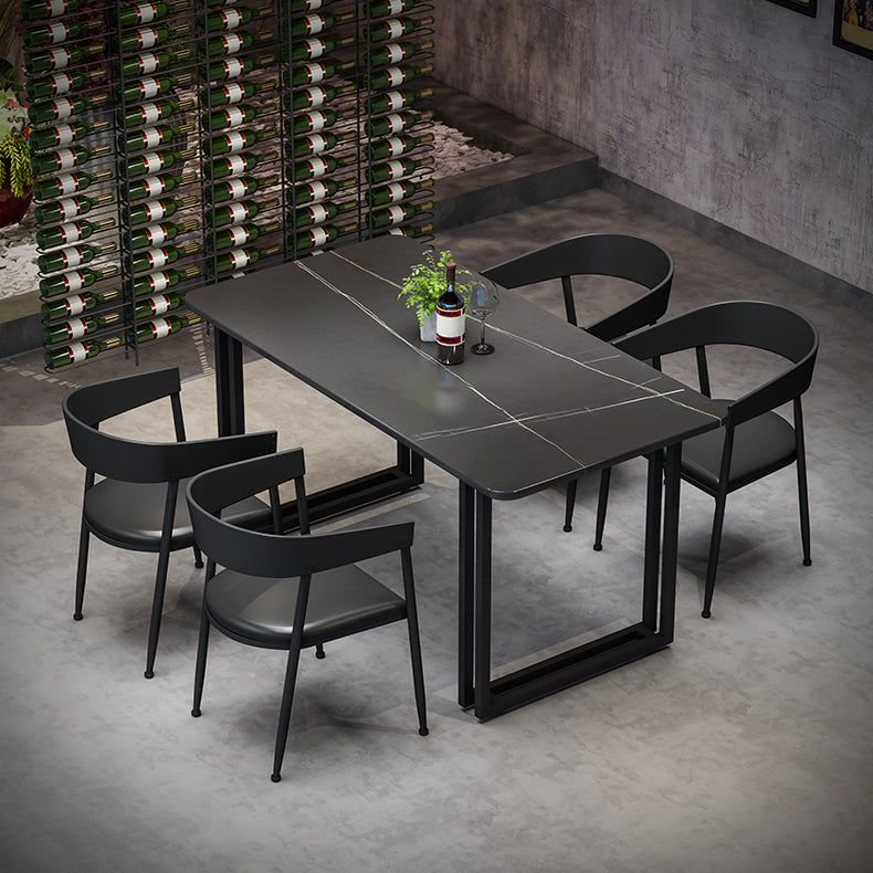 Mesa de comedor de estilo industrial Mesa de comedor de piedra sinterizada negra con base de metal