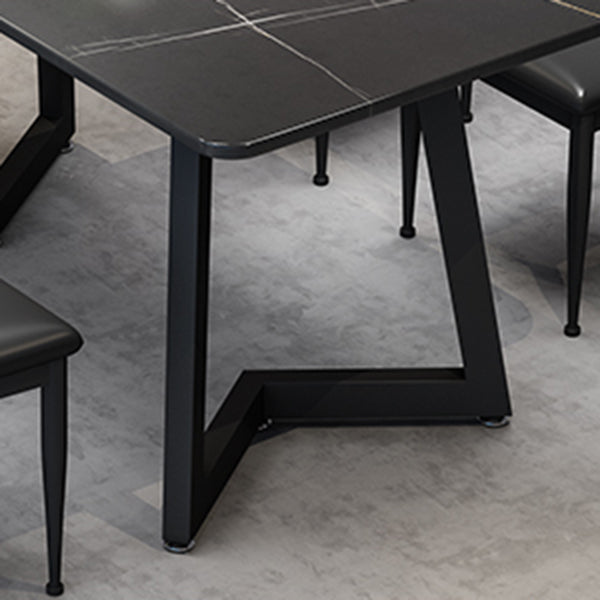 Mesa de comedor de estilo industrial Mesa de comedor de piedra sinterizada negra con base de metal