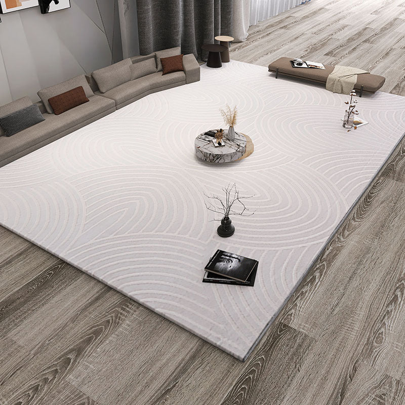 Alfombra moderna de gris claro poliéster alfombra marginada irregular alfombra lavable para sala de estar