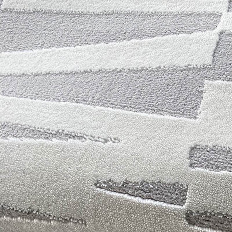 Alfombra moderna de gris claro poliéster alfombra marginada irregular alfombra lavable para sala de estar