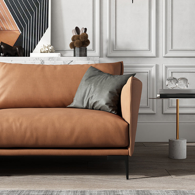 Salle de salon à armoine carré canapé orange standard avec coussins