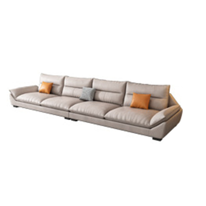 Flared Arm Beige Sectional Sofa with Chaise Pillowed Back Cushions Couch Sectional