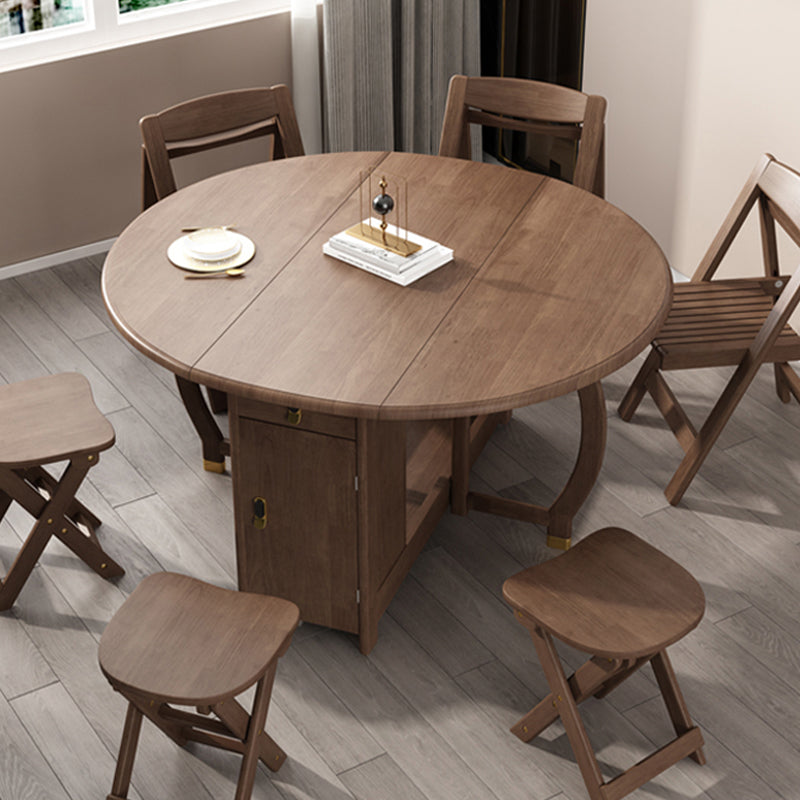 Table à manger pliable en bois d'hévéa, table ronde moderne et médiévale avec base sur tréteau de rangement