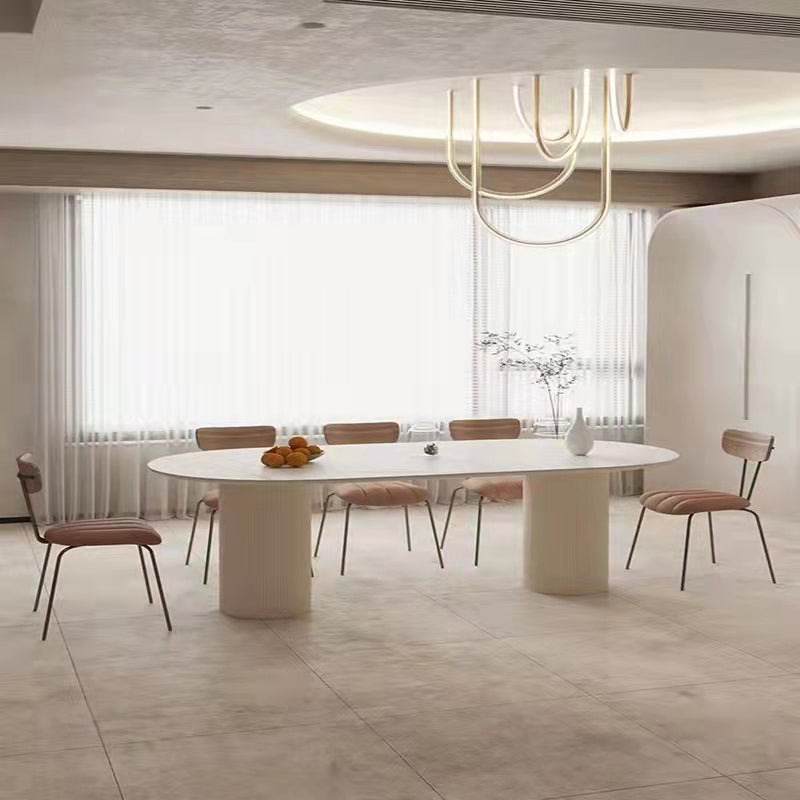 Table à manger ovale moderne en pierre frittée avec base à double piédestal